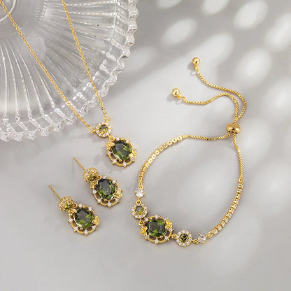 The three-piece set of gold-plated necklace, earrings and bracelet is an elegant wedding and party accessory for women.    Home Decor Supply | Online Retail | ShoreShopper.com